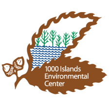 1000 Islands Environmental Center logo of a brown leaf with acorns and water and trees.