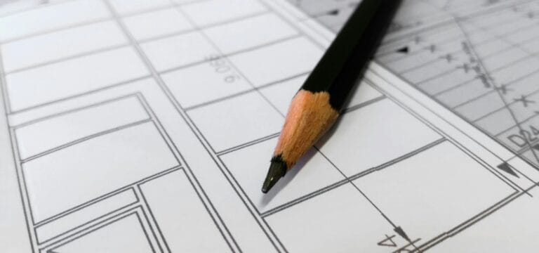 Stock image of a pencil on a drawing by Pixabay