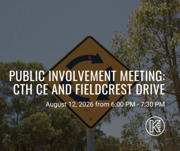 A road sign with circular arrows is set against a backdrop of trees. Text overlay announces a public involvement meeting about CTH CE and Fieldcrest Drive, scheduled for August 12, 2026, from 6:00 PM to 7:30 PM.